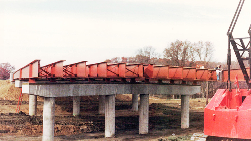 Support structures, made of concrete pillars and steel girders on top, are beginning to be built.